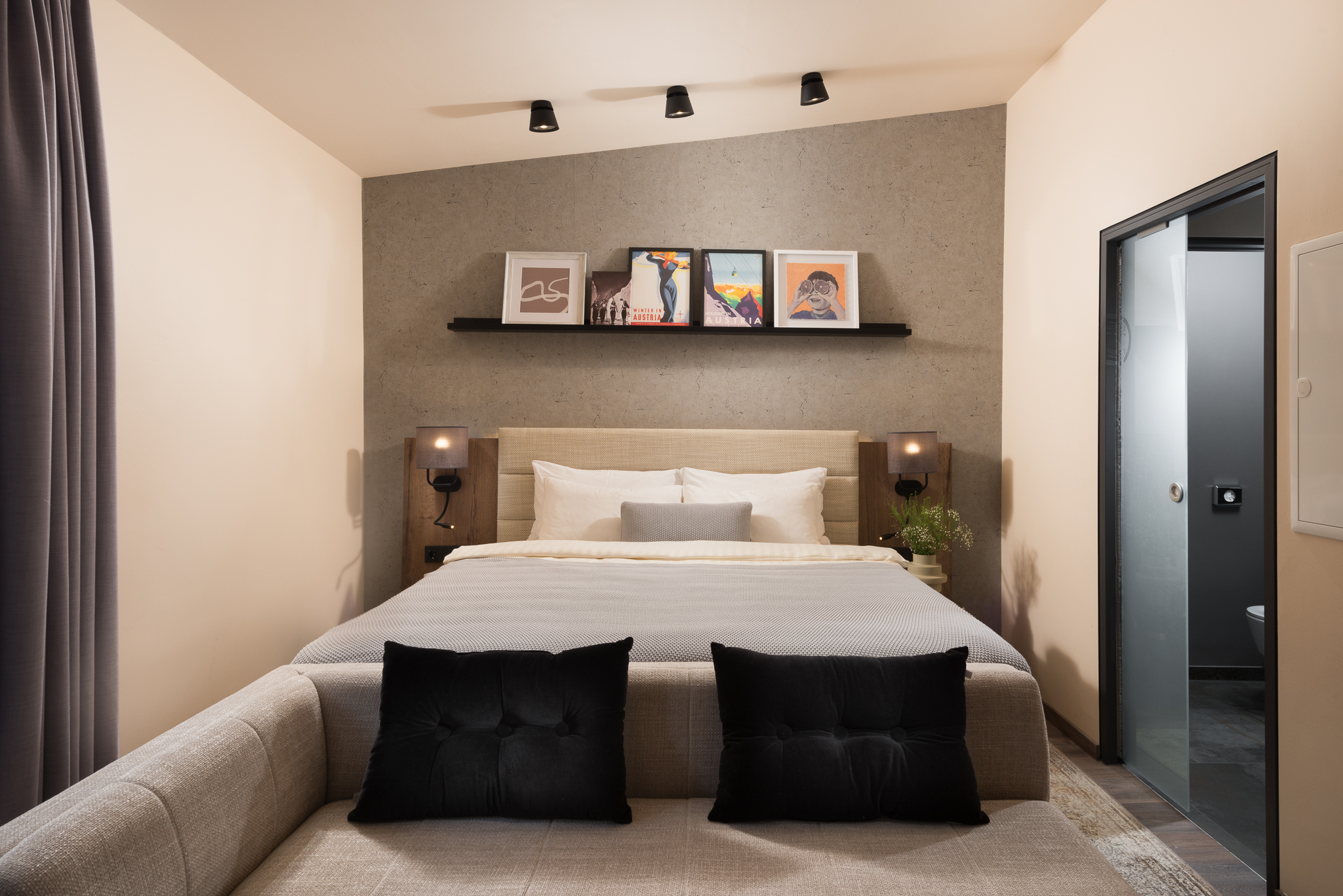 Elegant and comfortable bedroom at master Linzergasse, designed for a restful stay with soft lighting