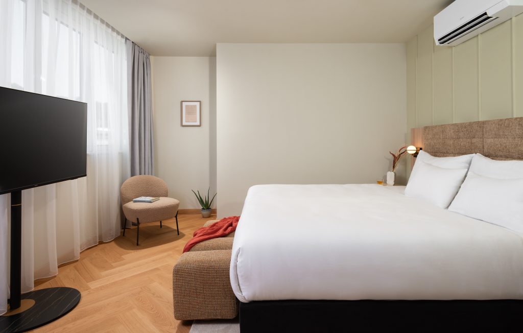 Spacious and elegantly designed penthouse room at master Mirabell