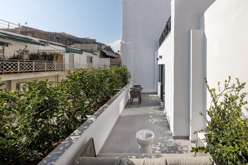 Charming private balcony in the Studio with Balcony at master Plaka Athens, offering a peaceful spot to enjoy Athens’ skyline.