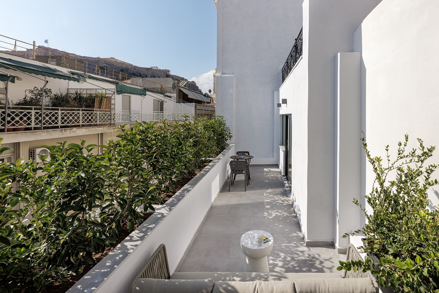 Charming private balcony in the Studio with Balcony at master Plaka Athens, offering a peaceful spot to enjoy Athens’ skyline.