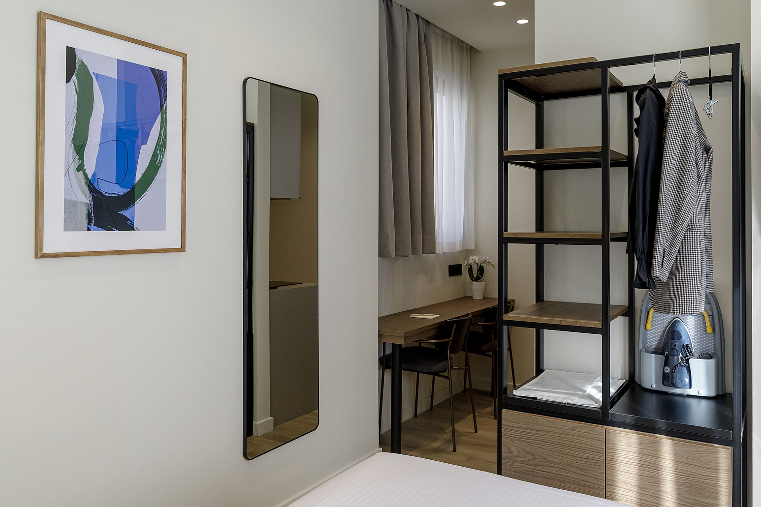 Minimalist yet cozy Studio Apartment at master Plaka Athens, with a soft bed and thoughtfully curated interior design.