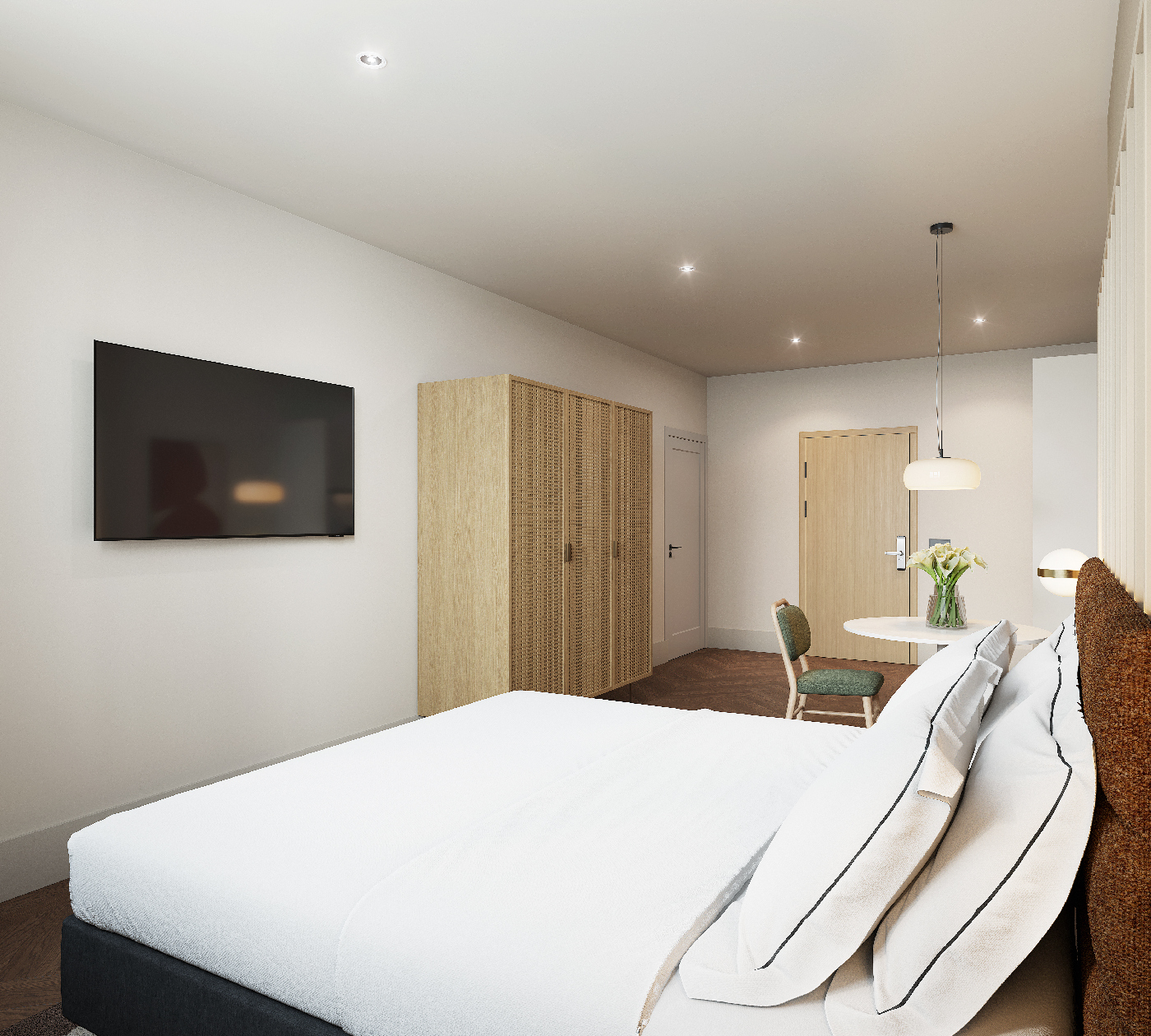 Spacious studio layout with large wardrobe, smart TV, and dining space at master Wola Warsaw serviced apartments.