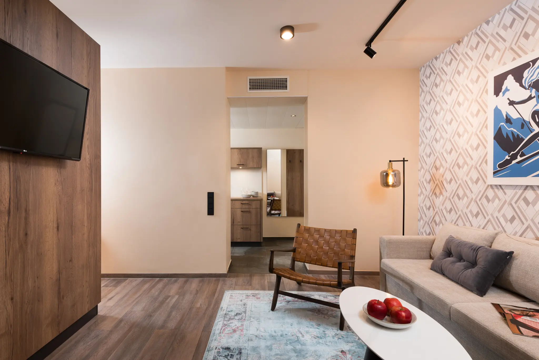 Cozy living space in the One-Bedroom Open Plan Suite at master Linzergasse, with contemporary furnishings and an open layout