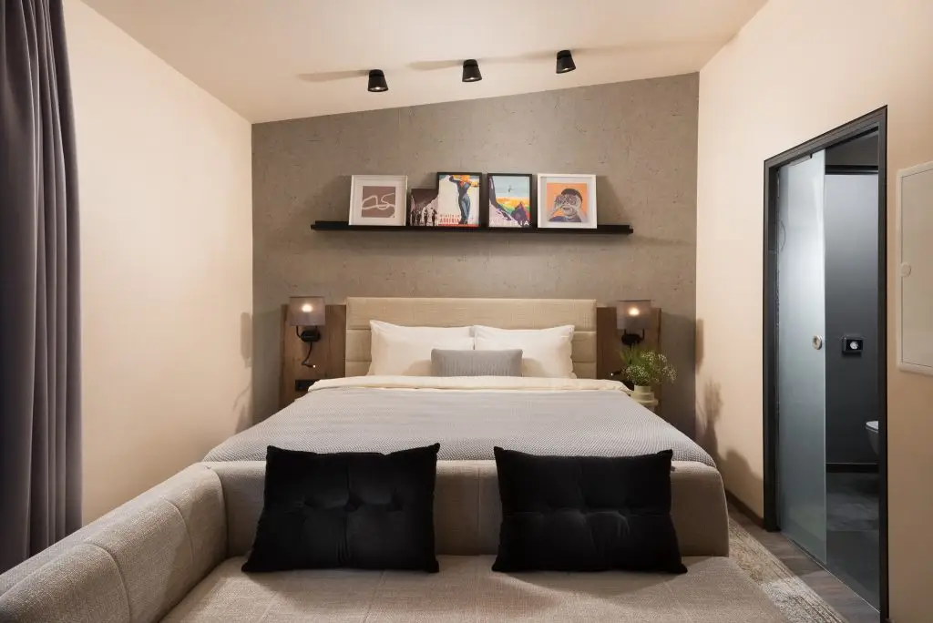 Elegant and comfortable bedroom at master Linzergasse, designed for a restful stay with soft lighting