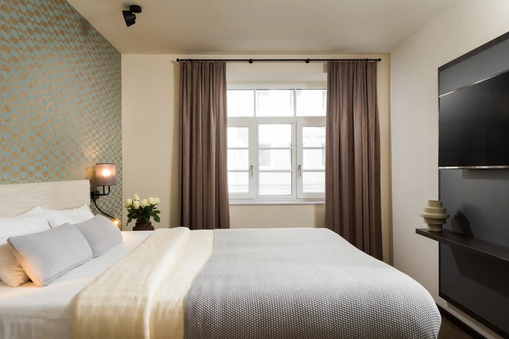 Soft and inviting bed at master Mirabell, perfect for a restful sleep.