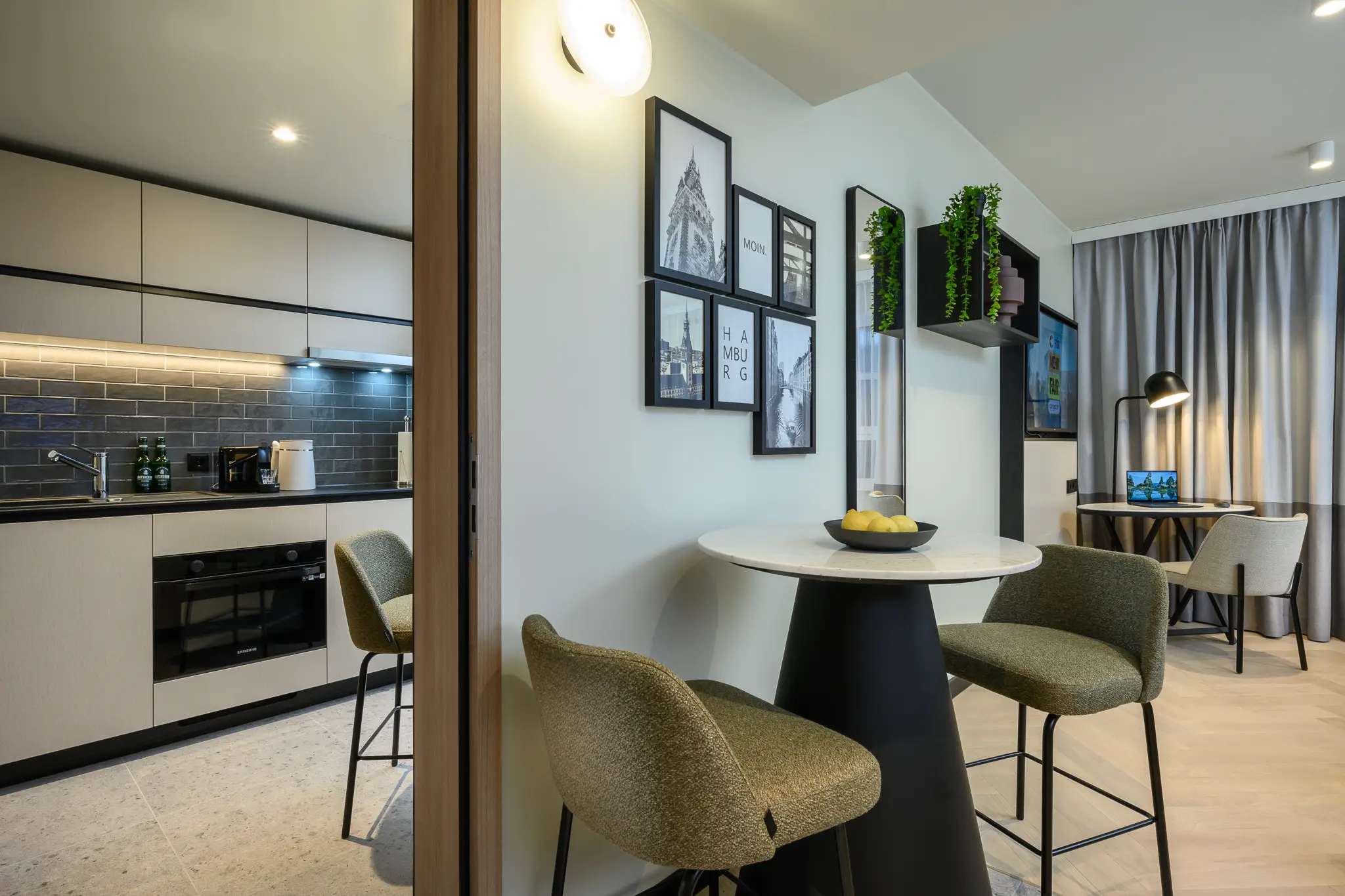 Seamless connection between the bedroom and kitchen in the Family Apartment at master Altona Hamburg, offering an open and functional layout