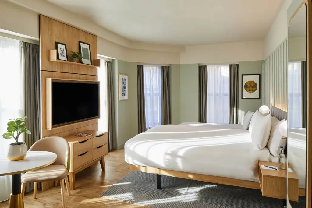 Spacious Studio with Sofa Bed at master St. Paul’s London, featuring a cozy bed, modern furnishings, and a stylish layout.