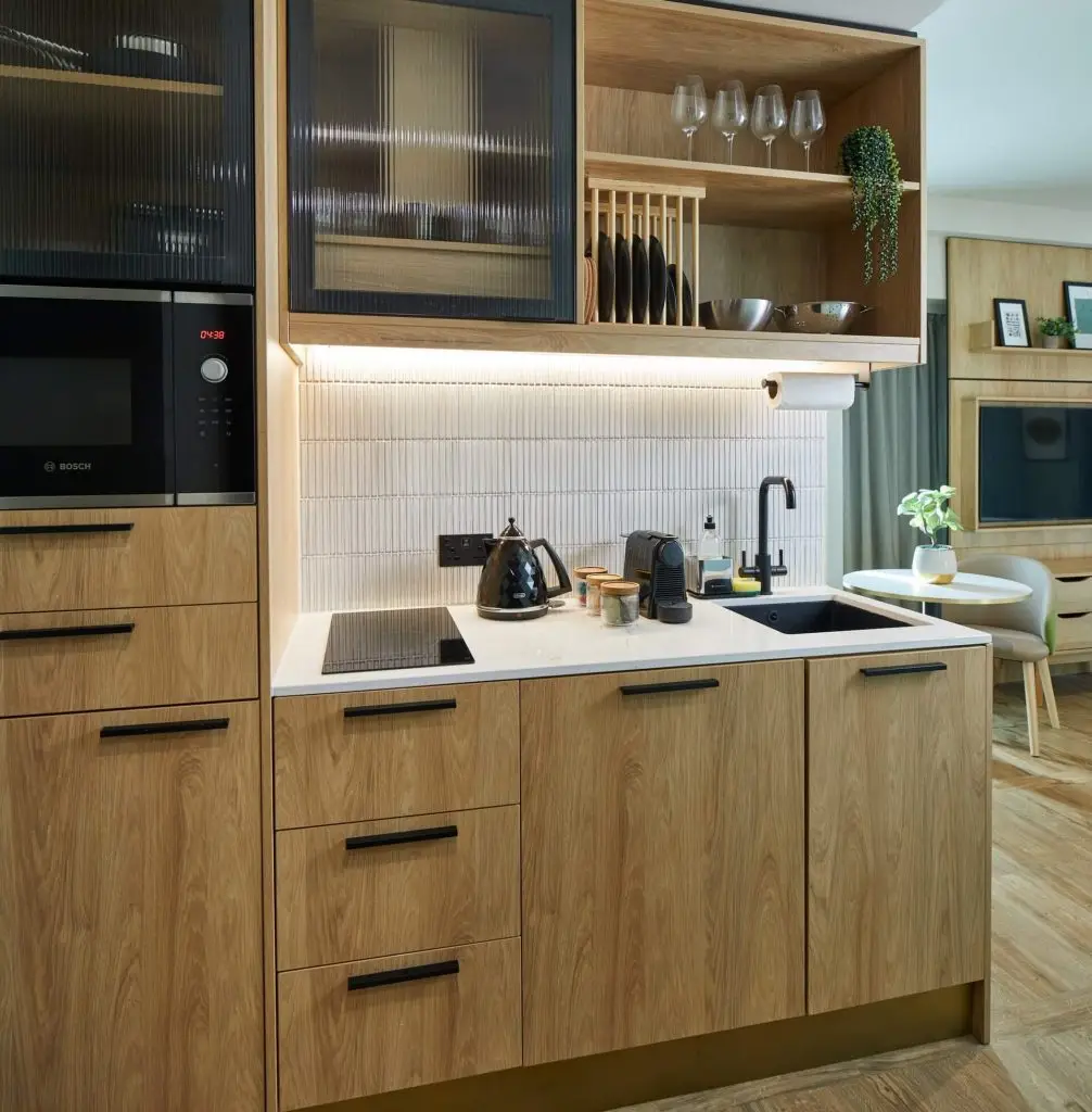 Fully equipped kitchenette in the Studio with Sofa Bed at master St. Paul’s London, designed with modern appliances and a functional layout.