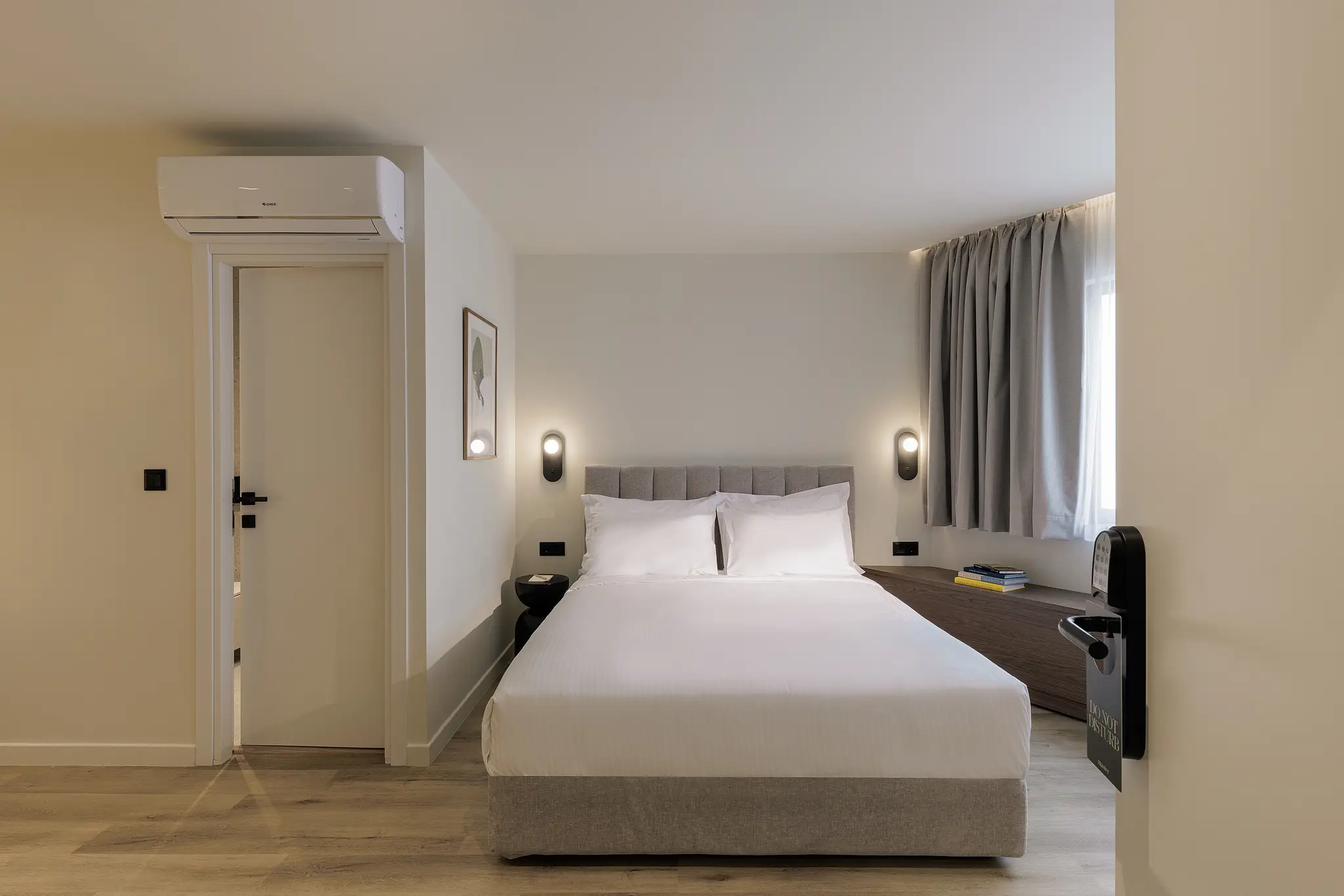 Bright and airy studio at master Plaka Athens, featuring a cozy bed and a relaxing ambiance.