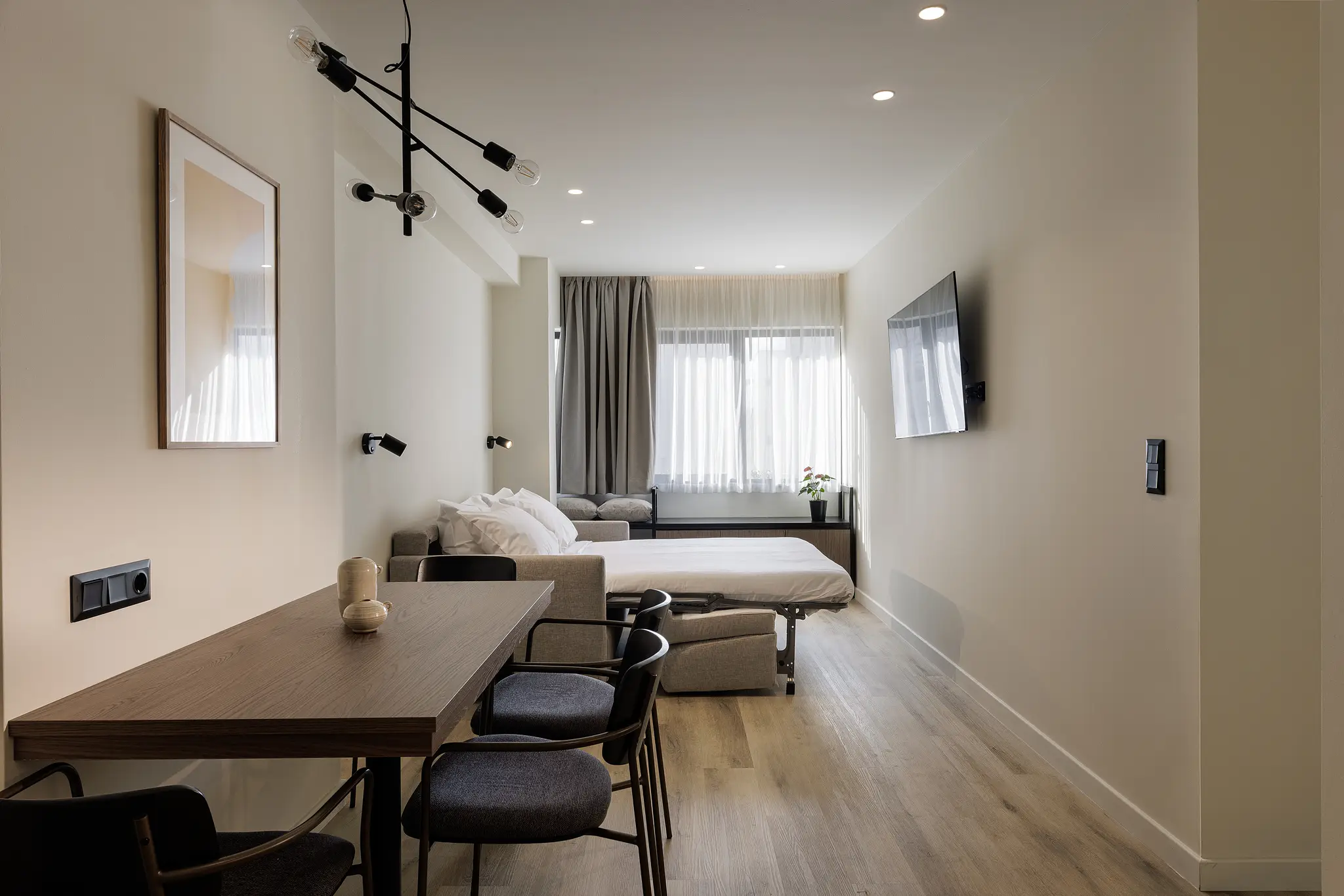 Sofa bed in the One Bedroom Apartment at master Plaka Athens, set up and ready for a comfortable night