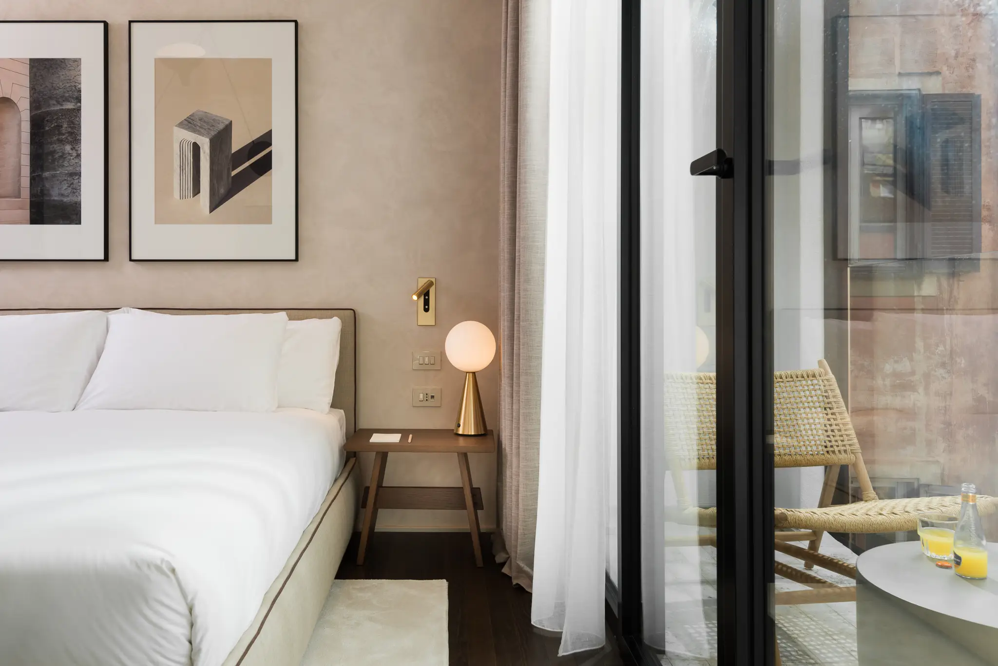 Plush bed in the Family Apartment at master Trevi Rome, designed with soft textures and warm lighting for a restful stay.